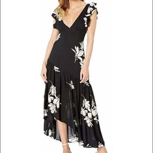She’s a waterfall maxi dress Free People 10 NWT
